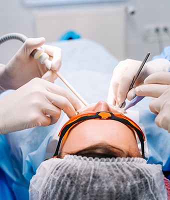 Patient undergoing tooth extraction